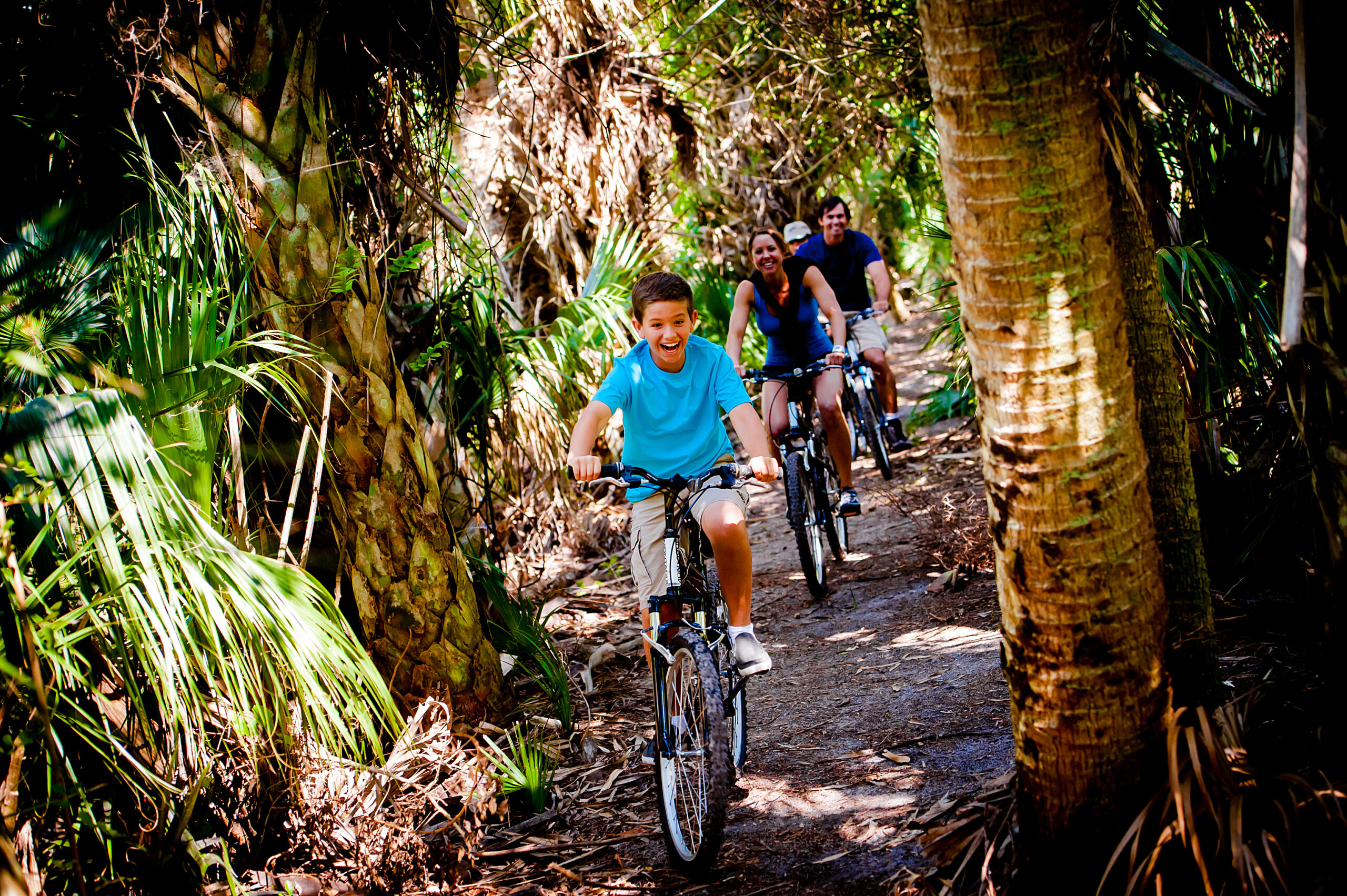 Riding bikes on a park trail