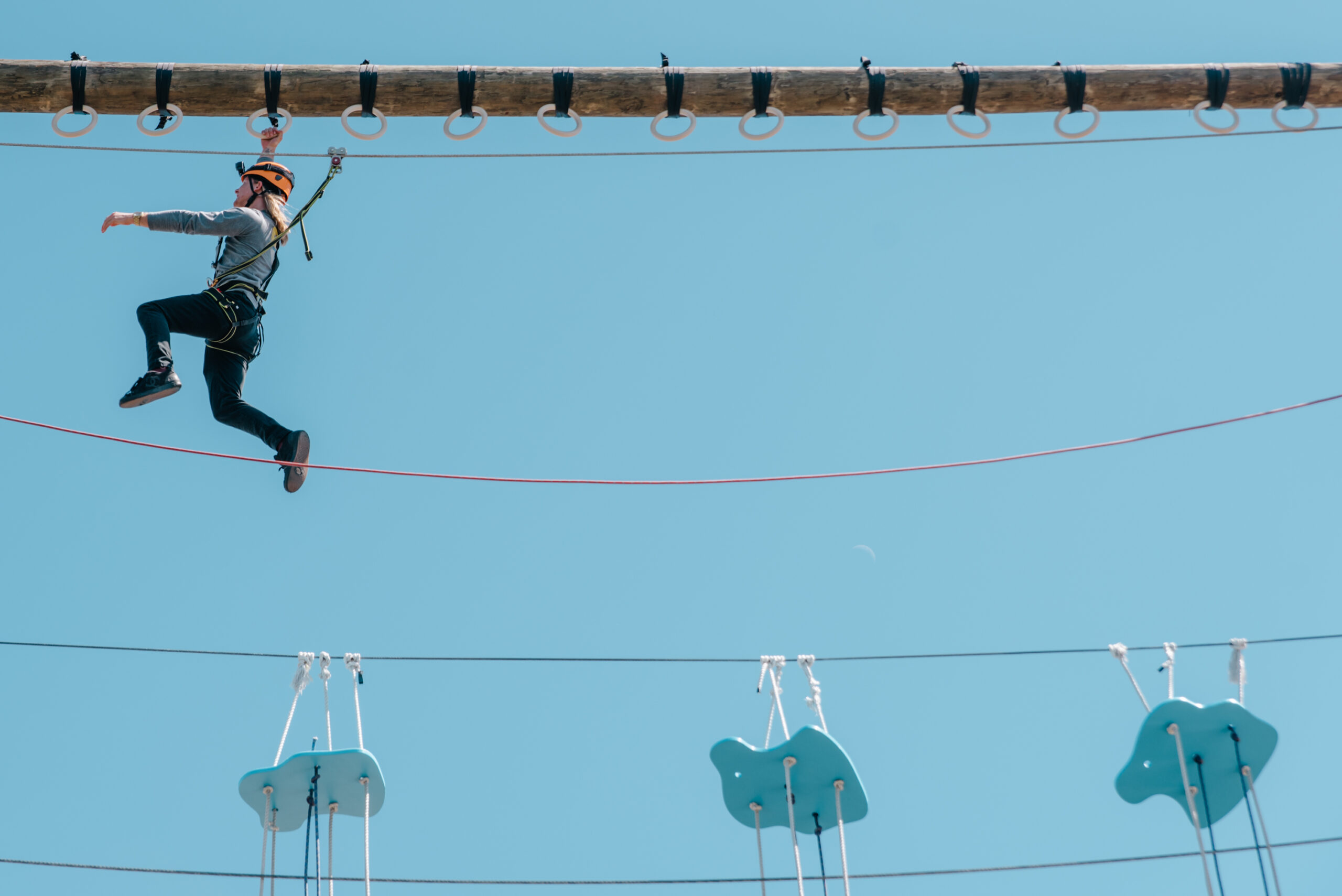 Overcoming the challenge of the ropes course at Cocoa Beach Aerial Adventures