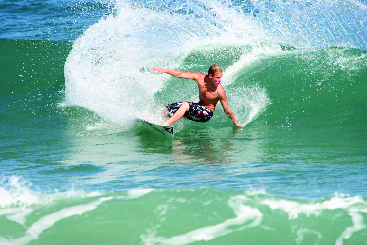 Surfing a wave in Cocoa Beach