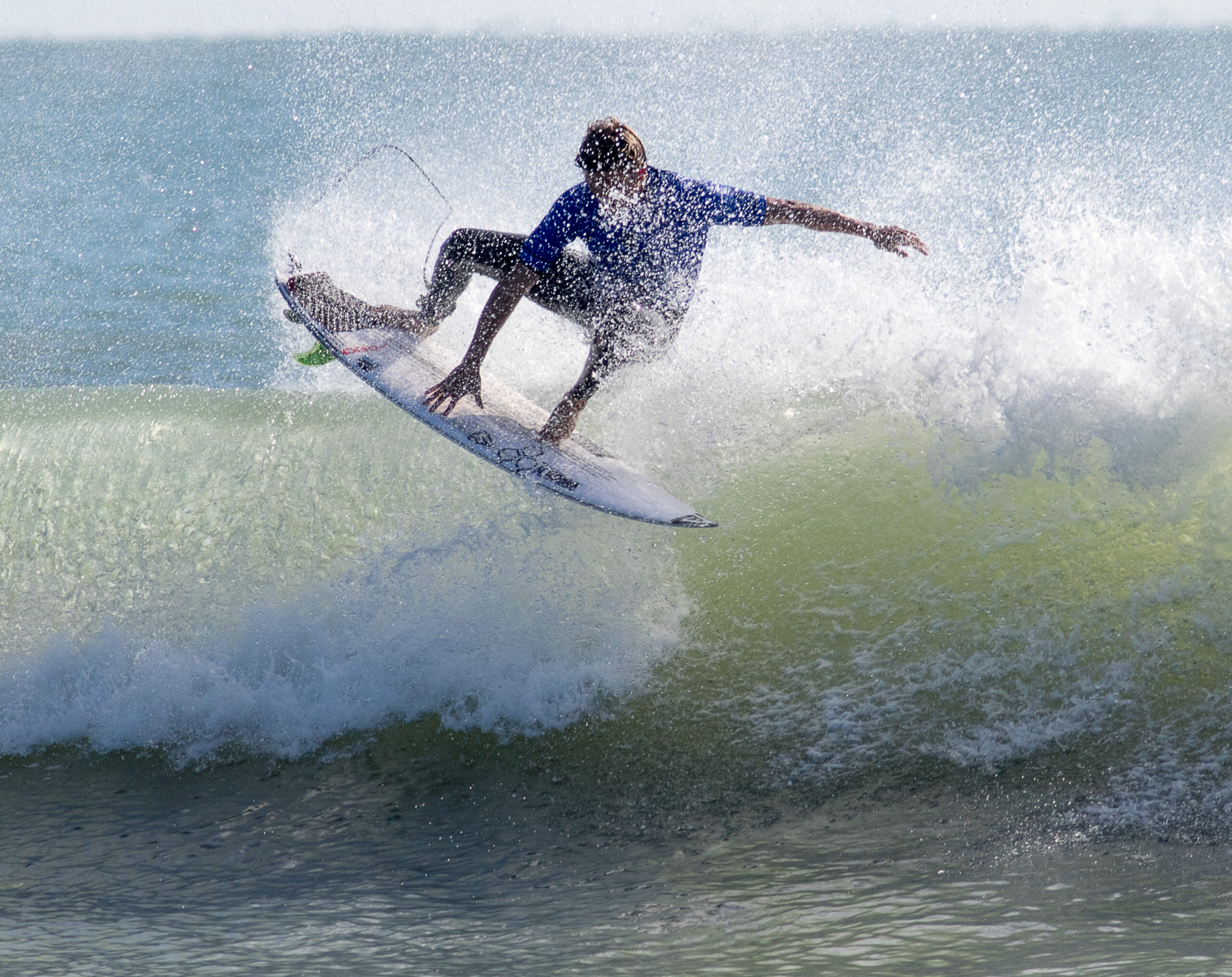 Surfer catching a wave