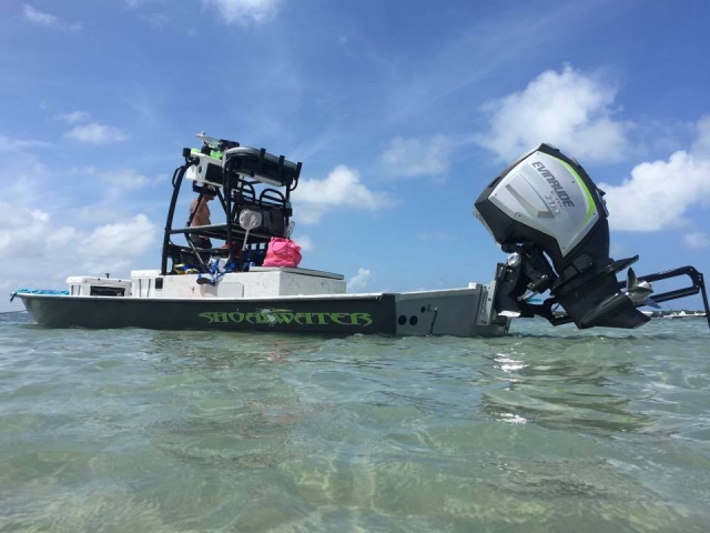 Going Coastal Fishing Charters Engine Up on Boat, Guy Fishing