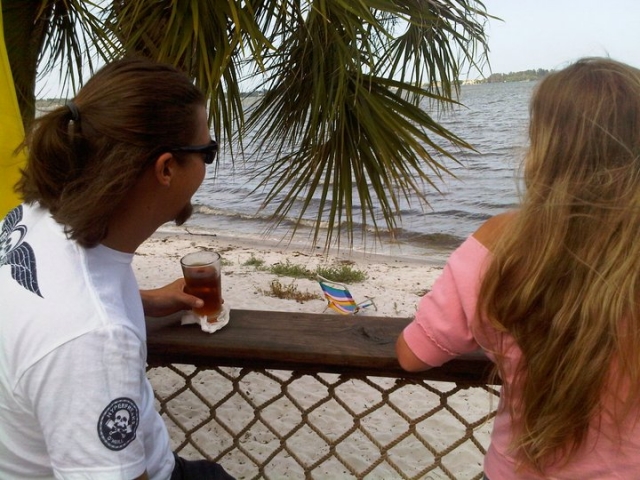 Pineda Inn Bar & Grill People Overlooking Water