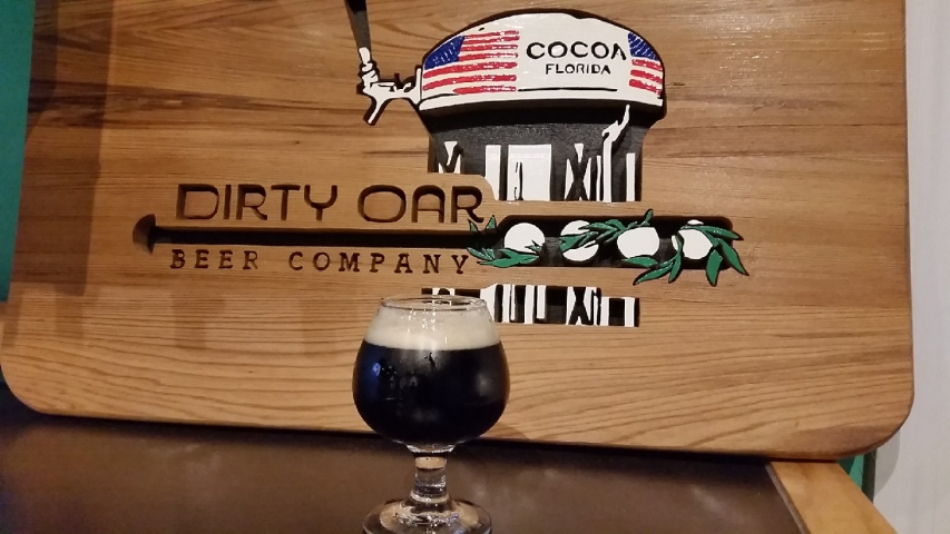 Dirty Oar Beer Company Draft in front of Logo