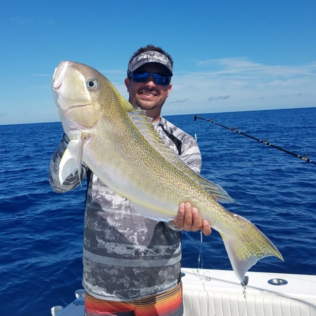 Anglers Envy Fishing Charters Fisher with Catch 1
