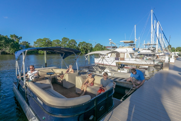 Cape Crossing Boat Rentals Family Waiting to be Untied from Dock