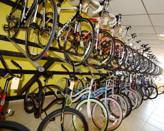 Adventure Cycles Bikes on Racks on Wall