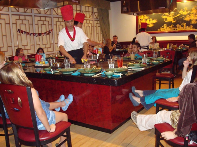 Fujiyama Japanese Seafood & Steak Guests Around Hibachi Grill 2
