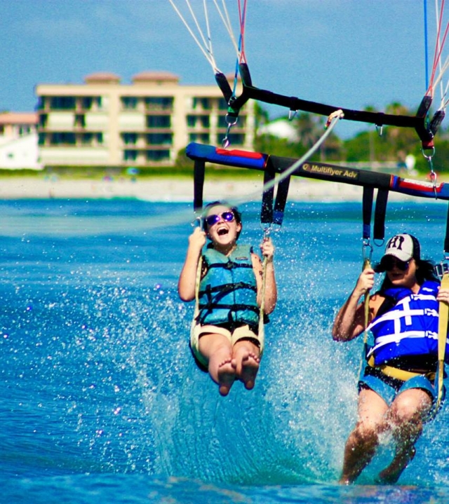 Cocoa Beach Parasail Friends Landing in Water