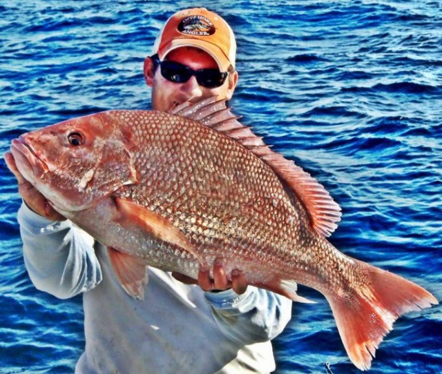 Cocoa Beach Sportsfishing Charters Fisher with Catch 2