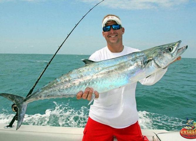 Fired Up Fishing Charters Fisher with Catch