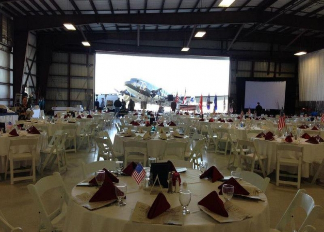 Florida Institute of Technology Event Dining Setup in Airplane Hanger