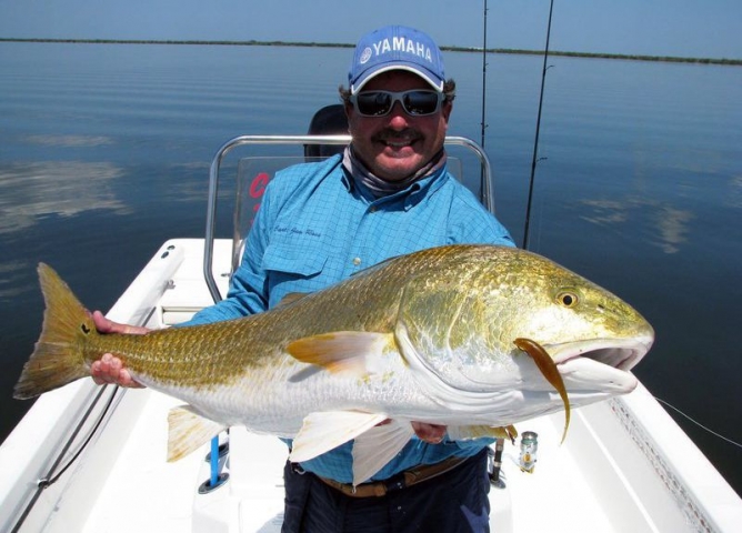 FineLine Charters w/ Capt. Jim Ross Man with Catch