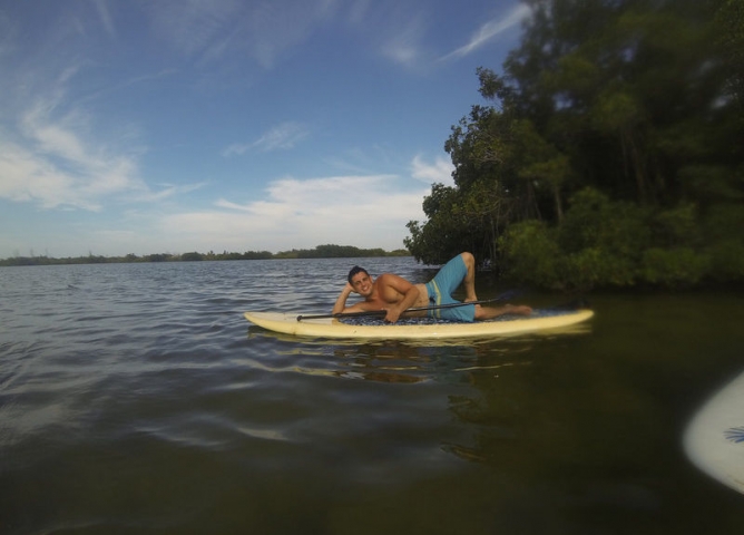 321 Kiteboarding Man Laying on Surfboard