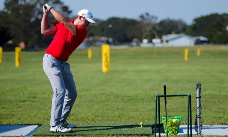 Practicing at the Singleton Golf Driving Range in Titusville, FL