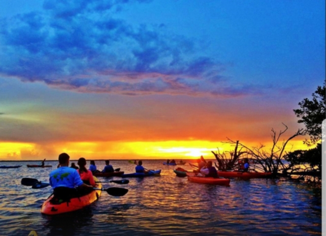 A1A Beach Rentals Group Kayaking at Sunset