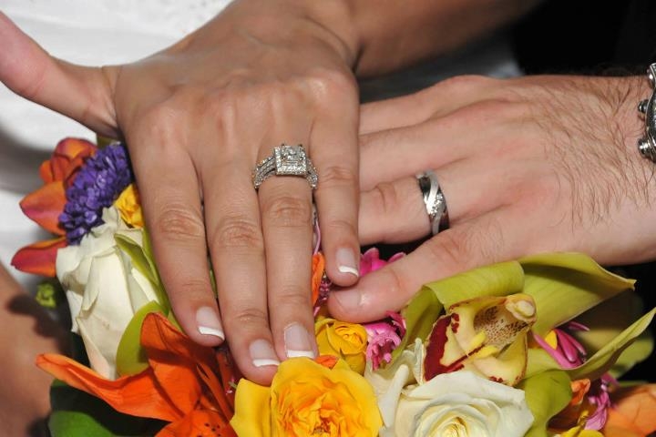 Cocoa Beach Photography Couple's Hands with Wedding bands