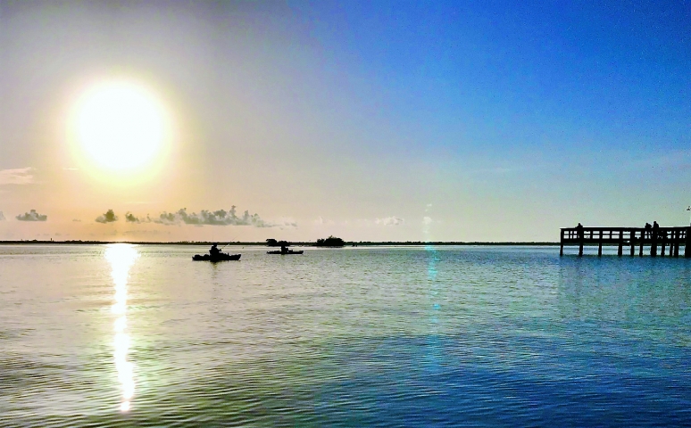 Living Waters Kayaking Group Kayaking under Large Sun