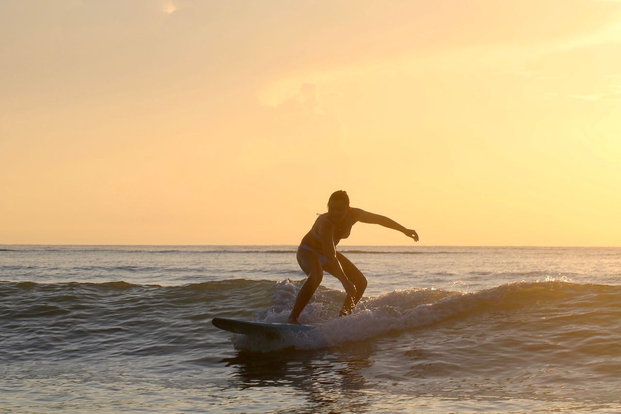 surfer in the sunrise