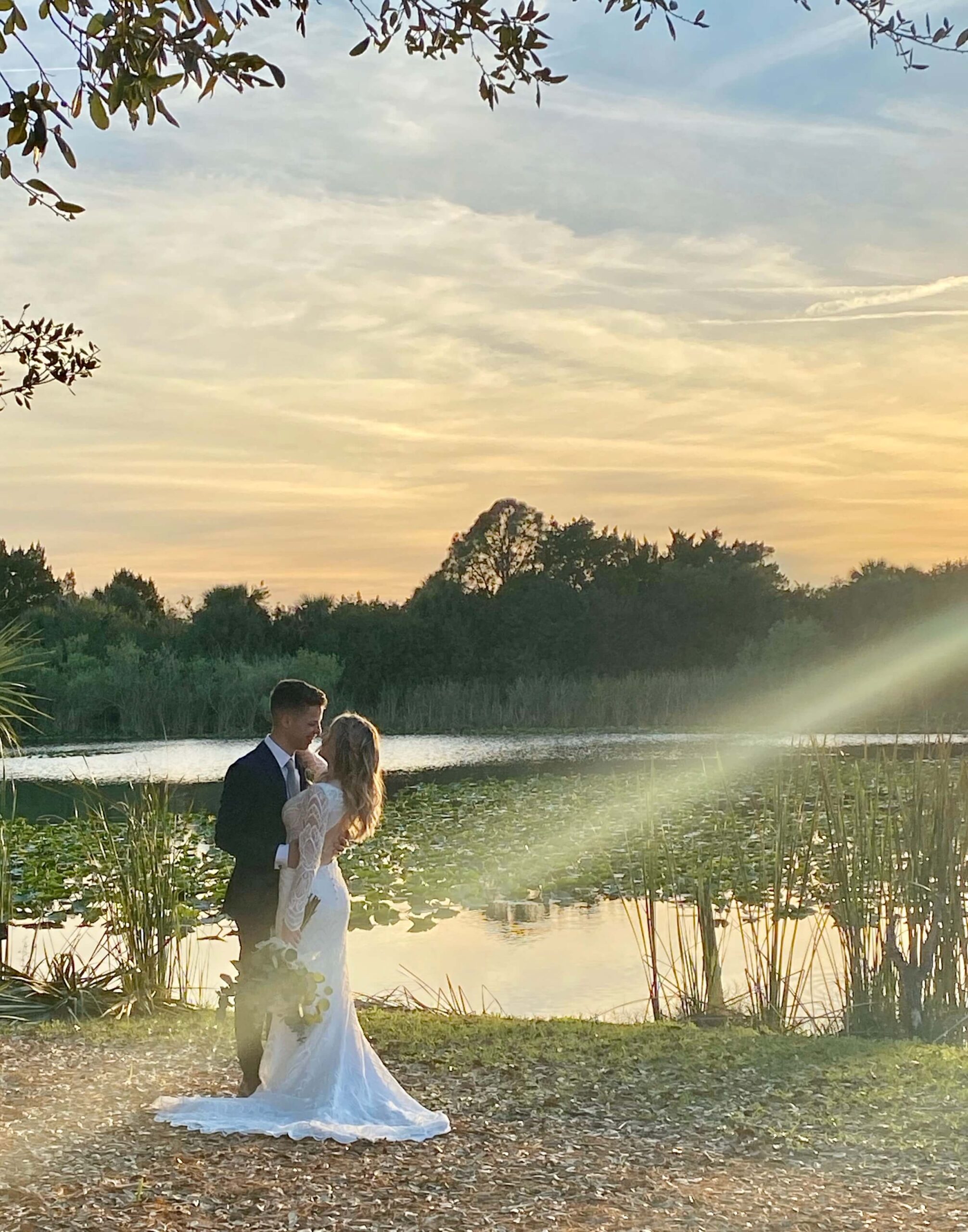 Rocking Ranch Wedding Couple near lake