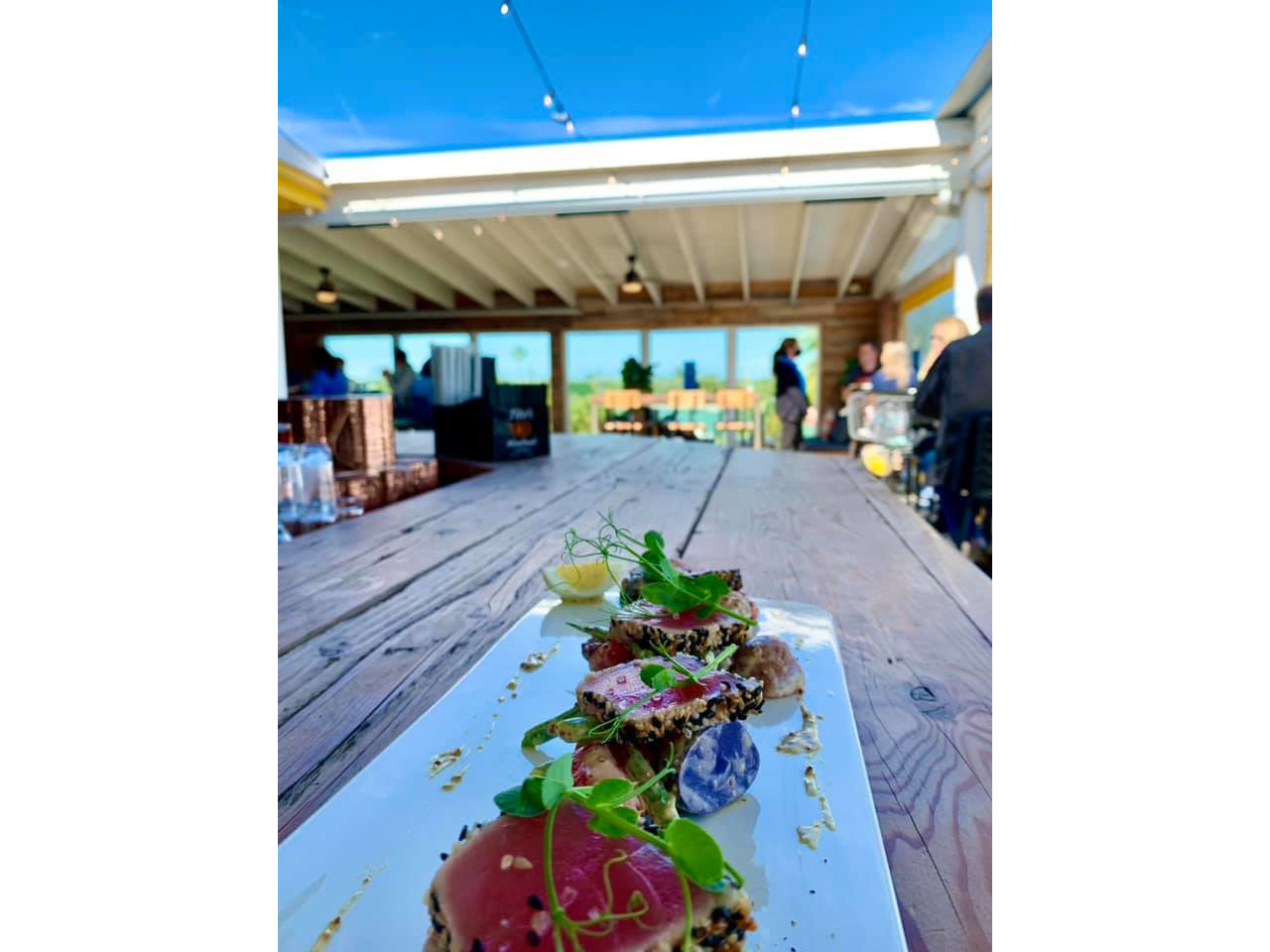 Djon's Village Market seared tuna at the bar on the rooftop