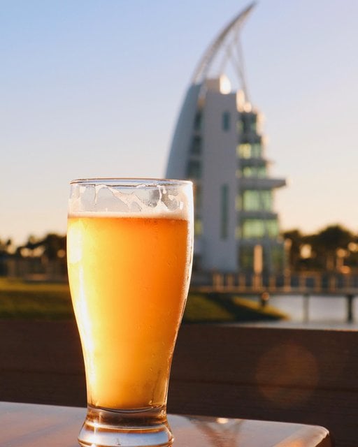 beer in front of exploration tower