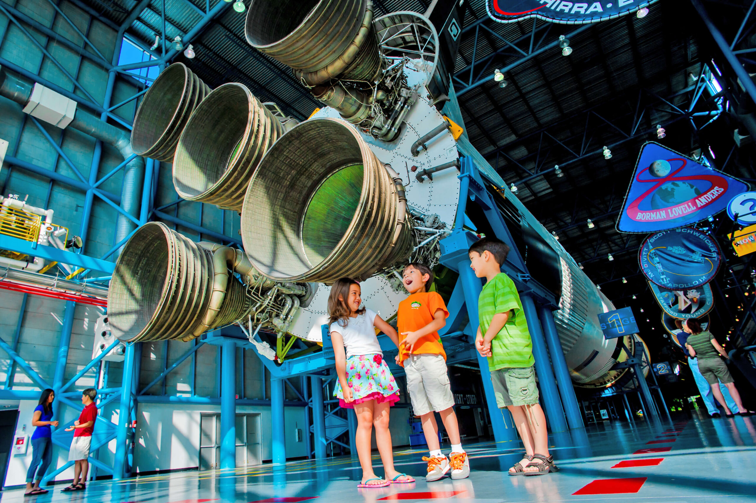 kids hang out in the Apollo/Saturn V  Center at Kennedy Space Center Visitor Complex