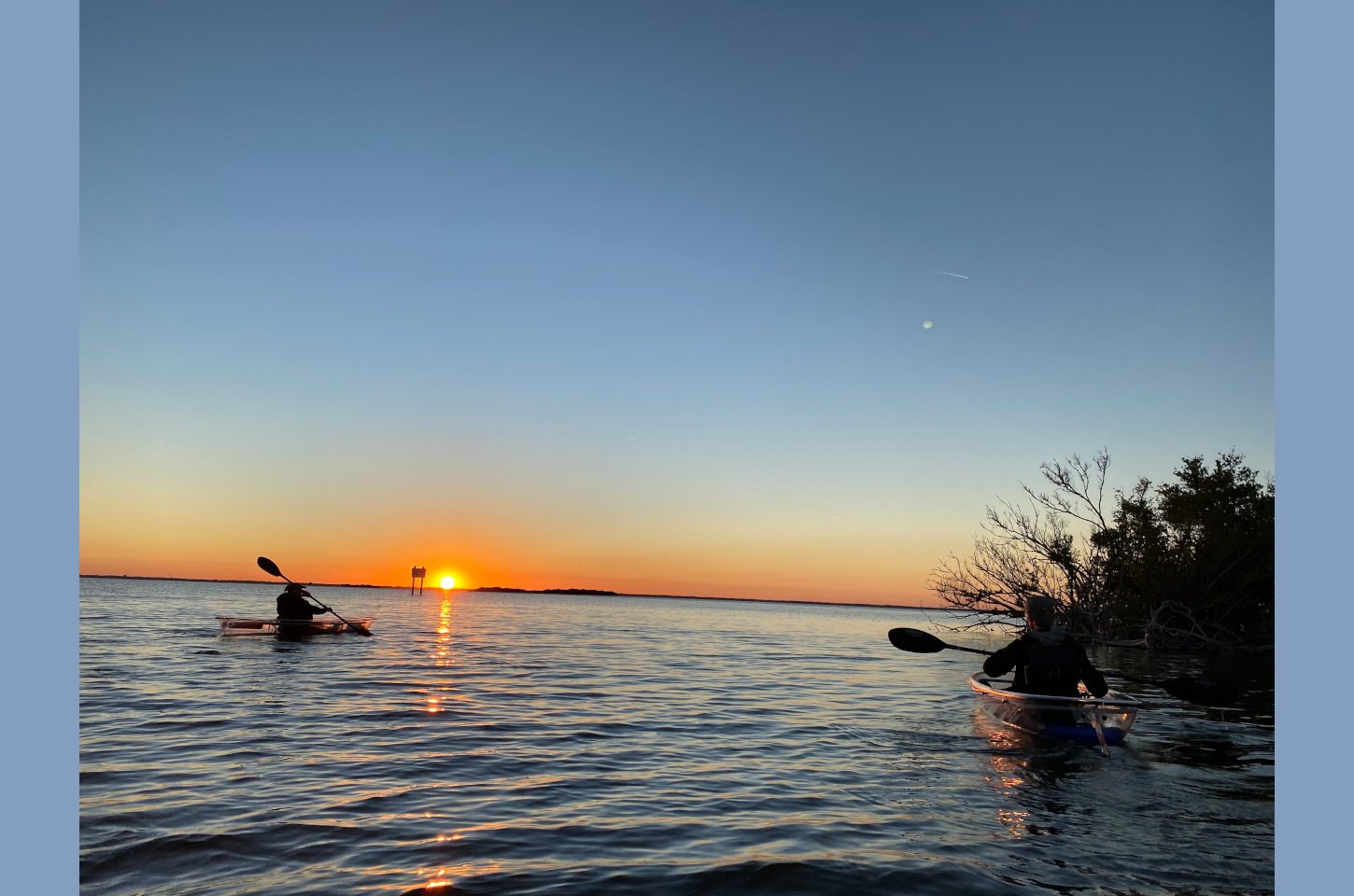 Kayakers on the Indian River at sunset