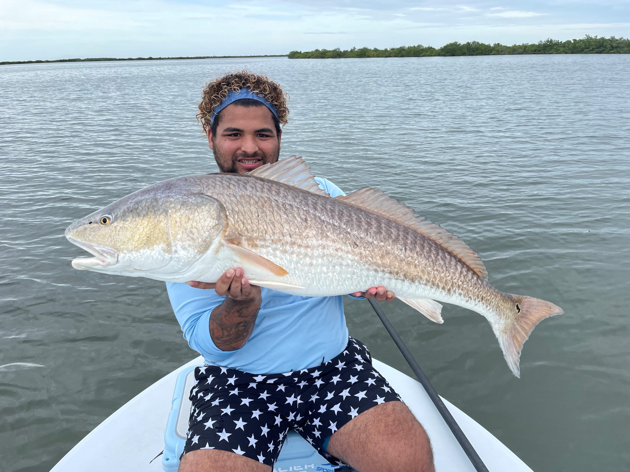 man with redfish