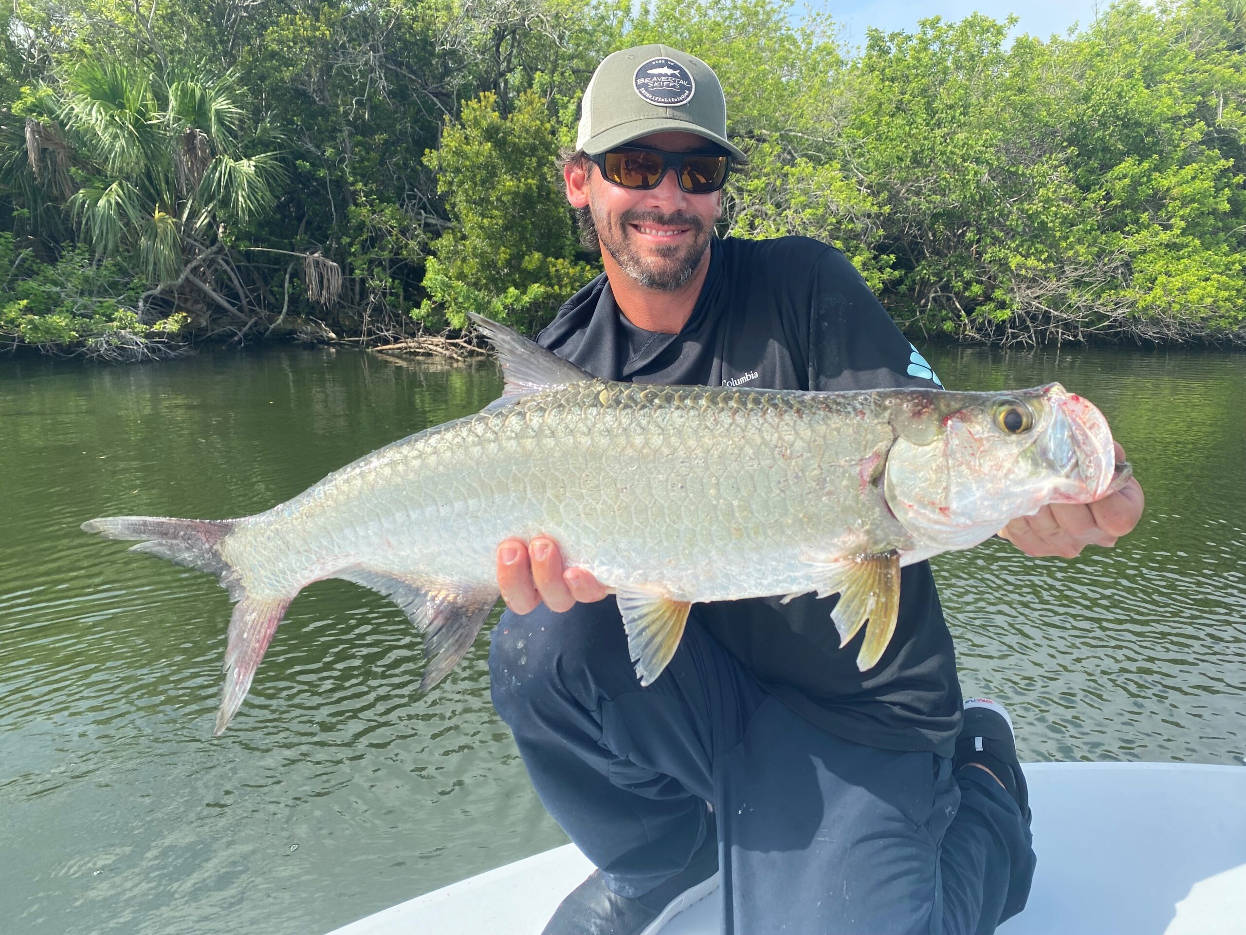 man with tarpon