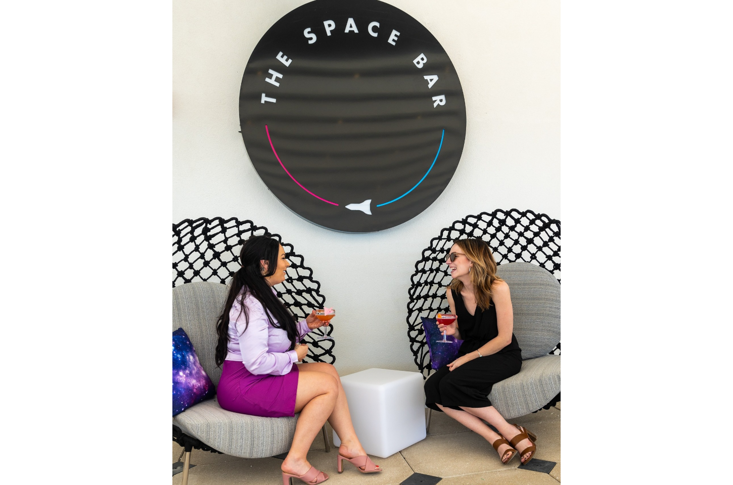 Women have cocktails at The Space Bar in Titusville