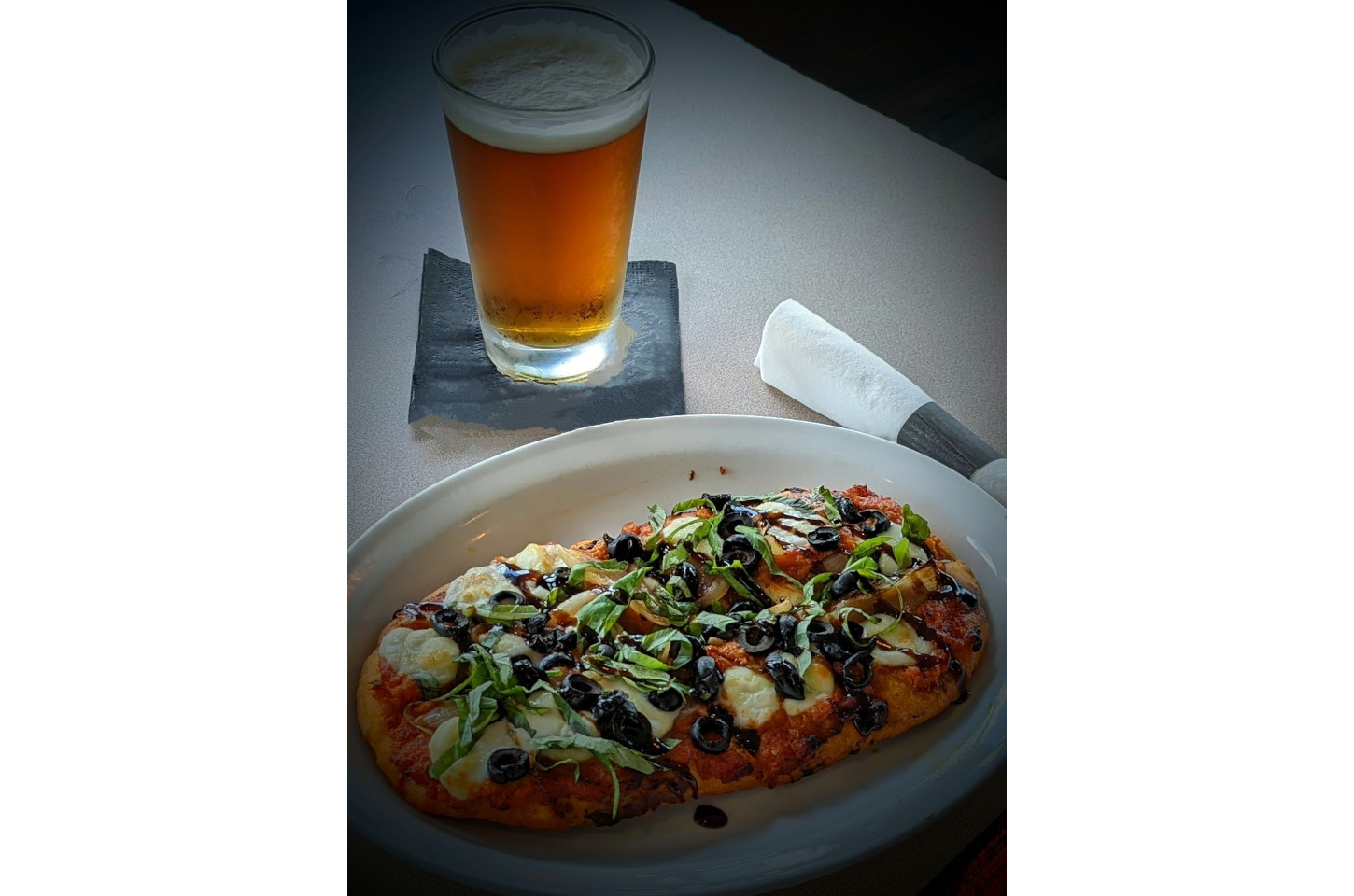 Pizza and Draft Beer at Blue Heron Restaurant