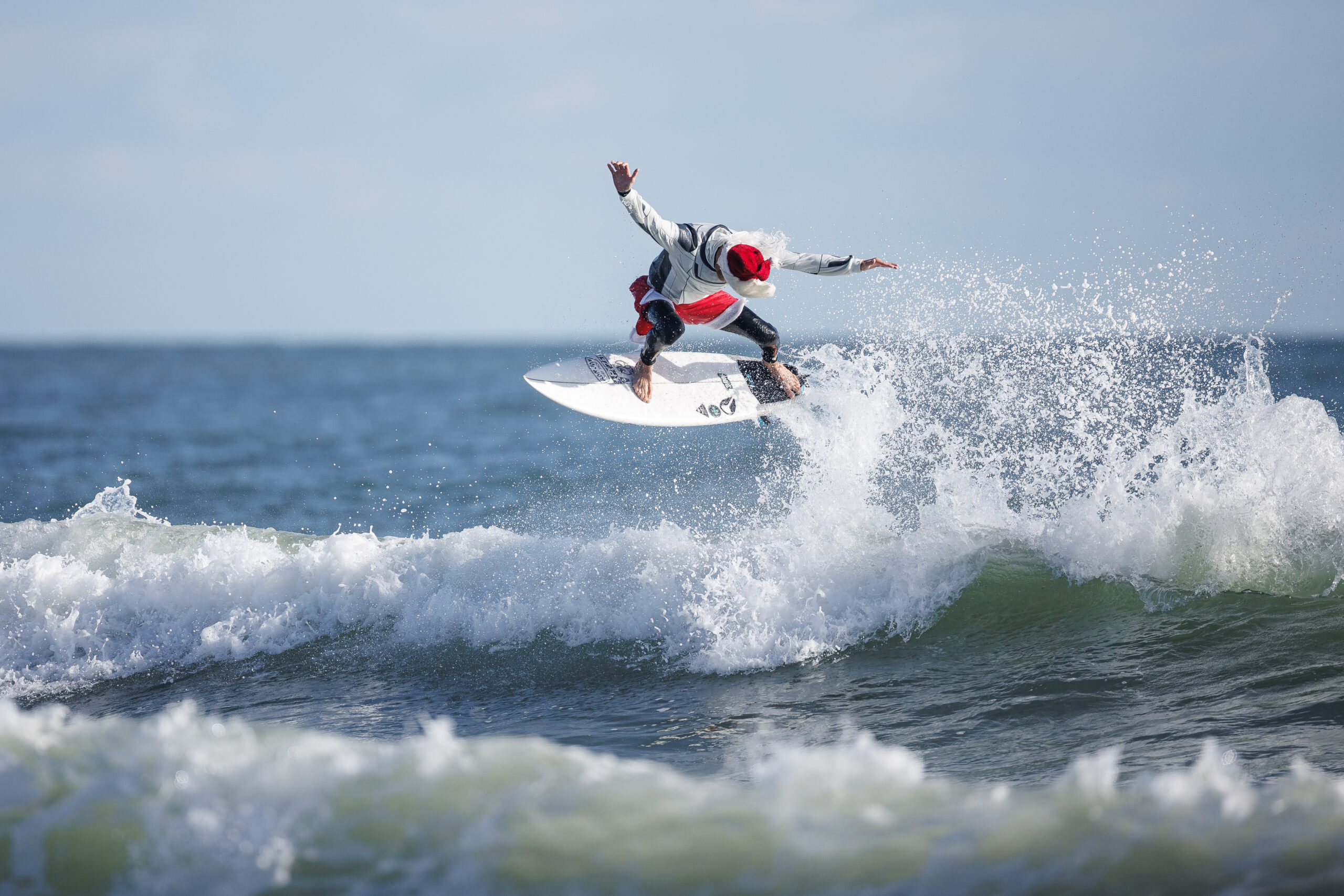 SURFING SANTAS