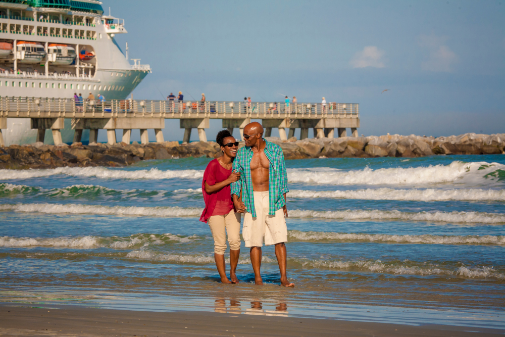 Couple Walks at Jetty Park Beach