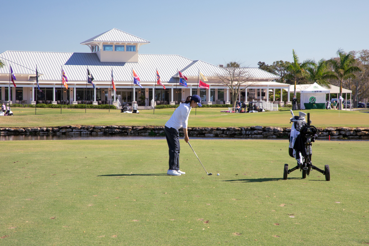 Golfer putting at the Moon Golf Invitational at the the Suntree Country Club