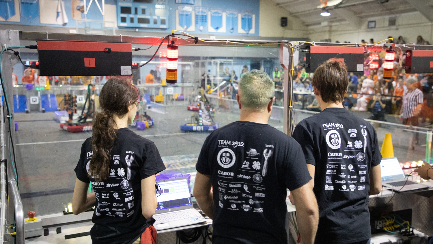 Teams compete in a robotics competition