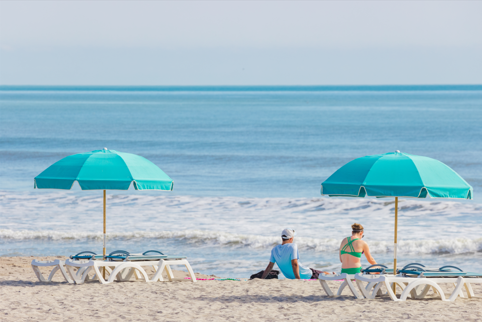 Beach umbrellas on a beautiful day on the beach